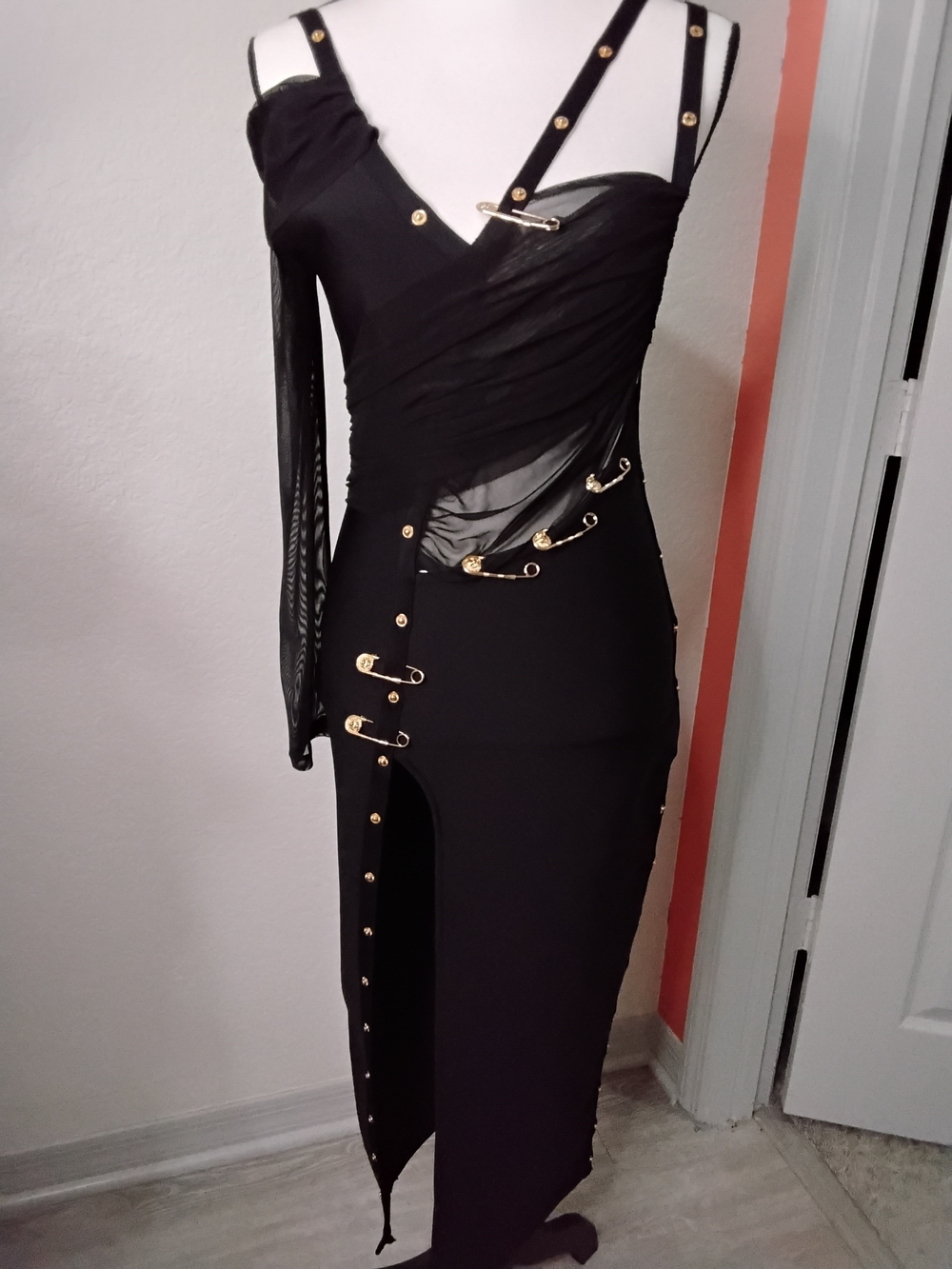 Black Asymmetric Dress with Gold Pin Accents